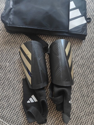 Adidas Tiro Junior Shinguards used with ankle support and case