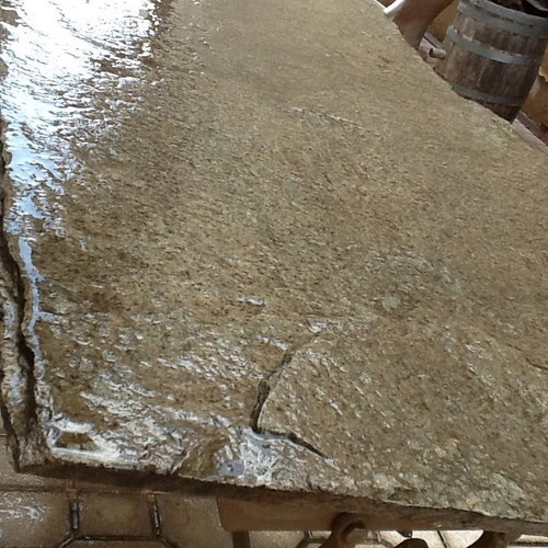 CAST IRON TABLE WITH STONE SURFACE-