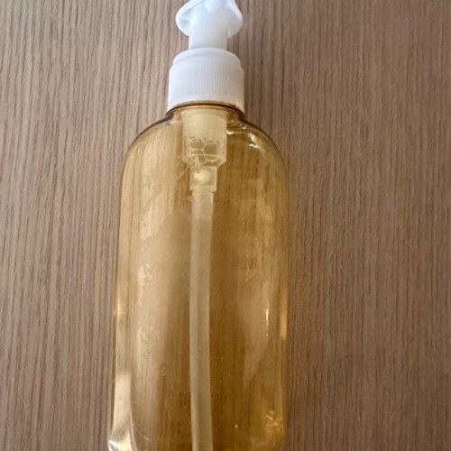 Plastic bottle with dispenser like new