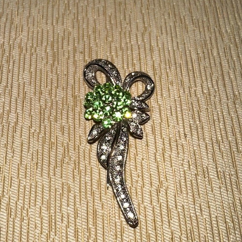 Decorative bow brooch vintage like new for clothing or bag