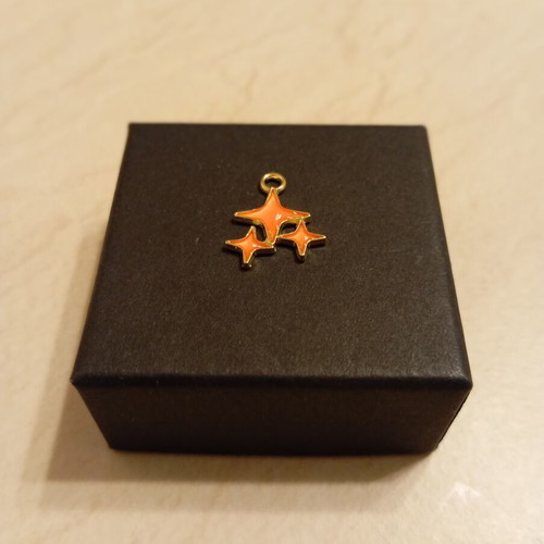Pendant with star design, gold plated, new