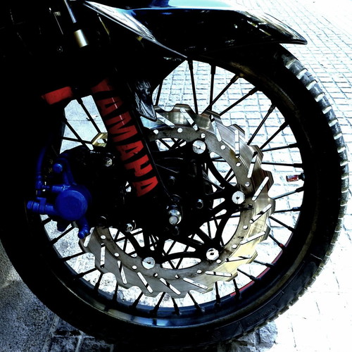 Complete motorcycle wheels with tires, disc and drum brakes