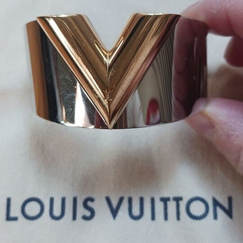 Louis Vuitton metal bracelet like new, gold and silver