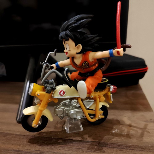 Dragon Ball Z Son Goku figure with yellow motorcycle new