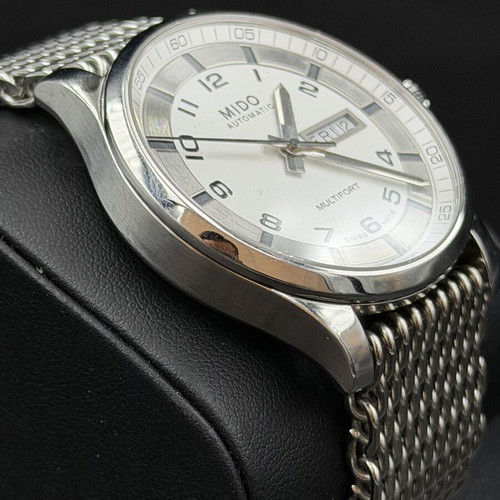 Mido automatic men's watch like new, silver color with box and strap