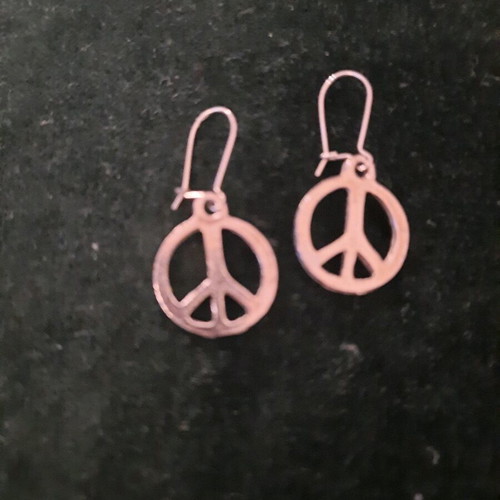 Vintage silver earrings with peace symbol like new