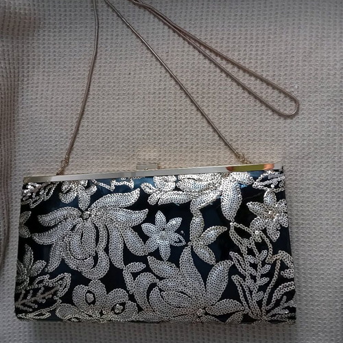 Clutch bag with floral gold sequin embroidery and matching wallet