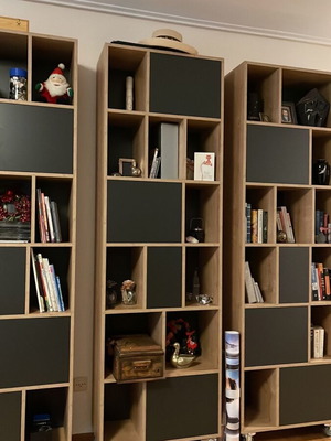 Bookcase set of three pieces like new with wheels and push button doors
