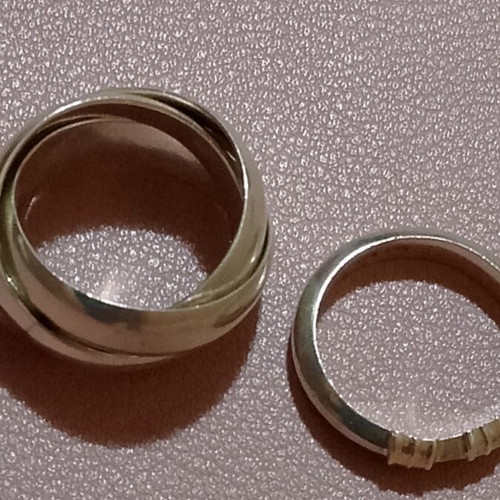 Silver 925 rings, one triple band and one with 585 gold tones