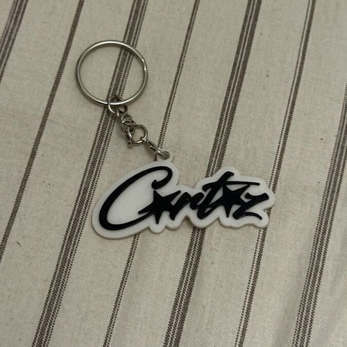 Corteiz keychain new, black and white