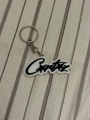 Corteiz keychain new, black and white