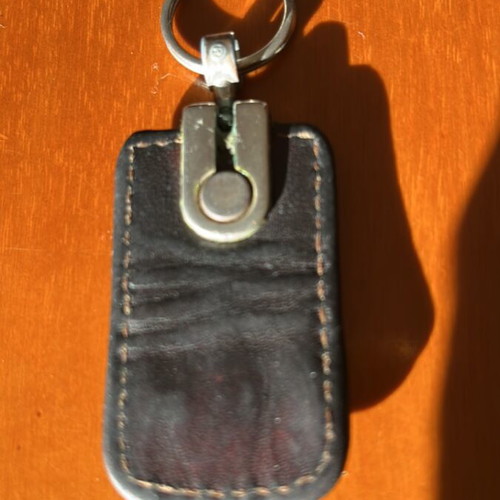 Guy Laroche leather keychain used, brown