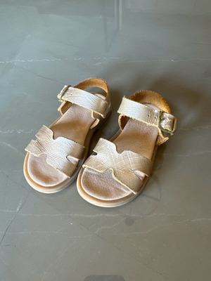 Leather sandals used, size 24, gold color