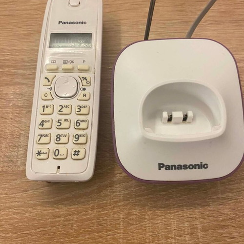 Panasonic KX-TG1611GR cordless phone, white and purple