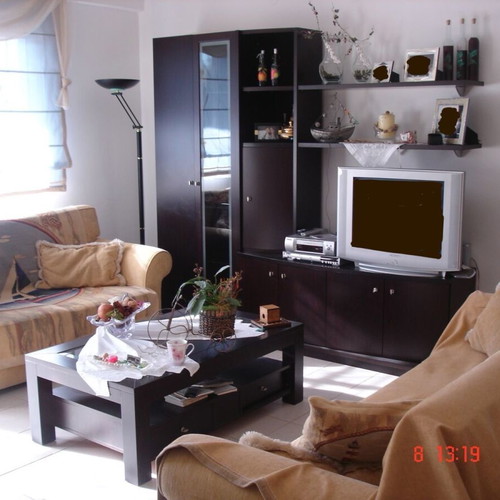 Wooden living room unit like new with glass cabinet and lighting