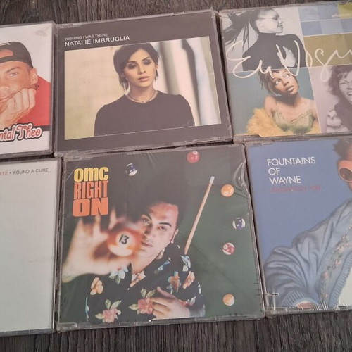 CD singles 90s new, pack of 18 sealed