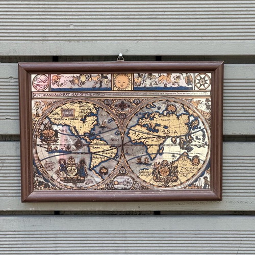 Decorative mirror with antique world map used, wooden frame
