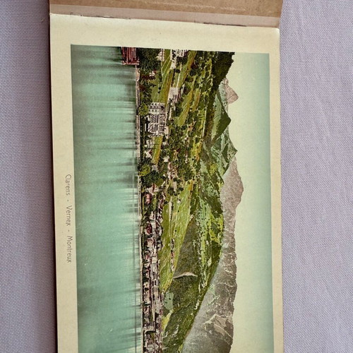 Leather-bound book with used Swiss Geneva postcard images