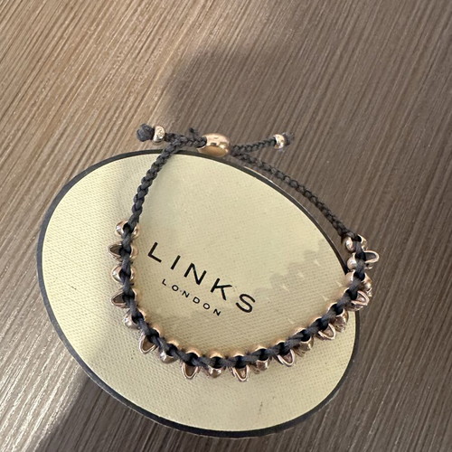 Links Of London collectible bracelet like new, rose gold and black cord