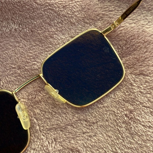 Gigi Hadid sunglasses authentic new gold with case and cloth