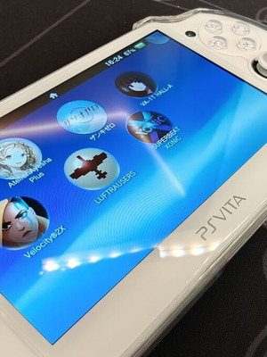 Sony PS Vita OLED 1000 бял като нов с аксесоари