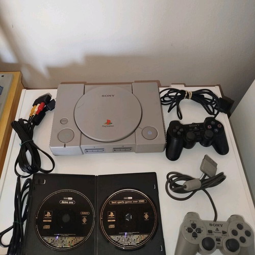 PlayStation 1 used with cables, two demos and two controllers