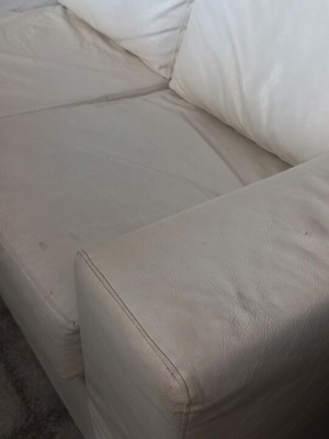 Two-seater sofa used, white eco leather