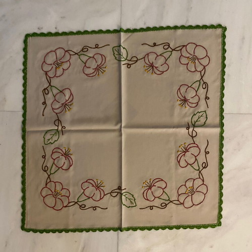 Handmade tablecloth with embroidery and lace used