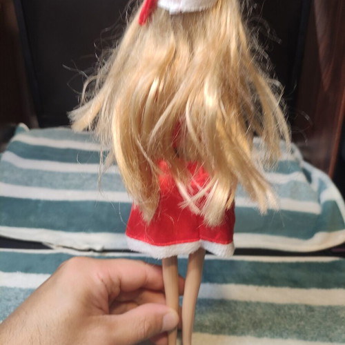 Doll dressed as Santa Claus used