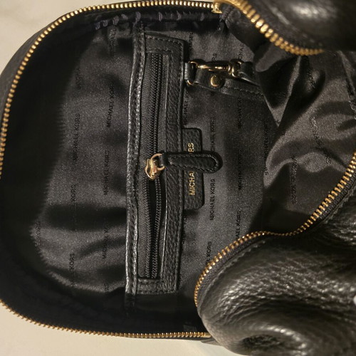 Michael Kors black backpack like new with gold details