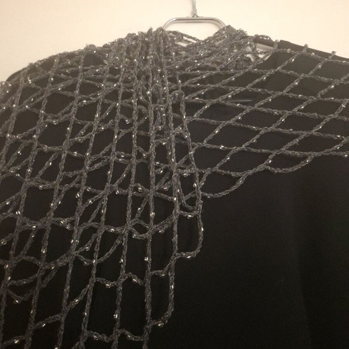 Knitted perforated scarf grey like new with beads