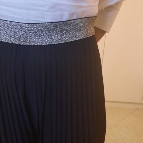Pleated pants black like new with silver band at waist size M