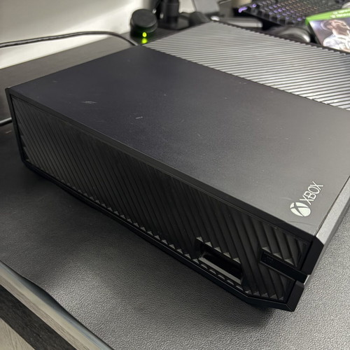 Xbox One 1TB console used with controller and 2 games