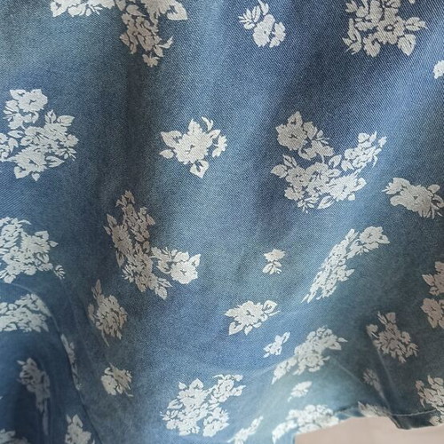 Denim skirt with flowers size large like new, blue
