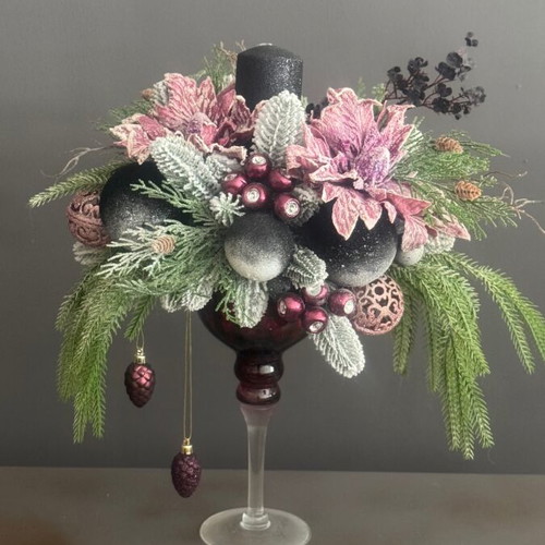 Christmas decoration in glass candlestick