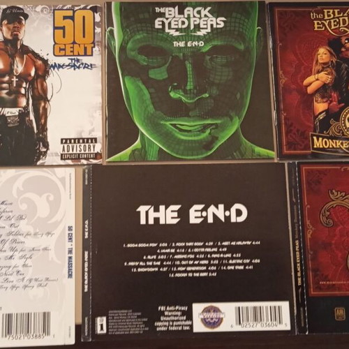 50 Cent and The Black Eyed Peas booklets used, pack