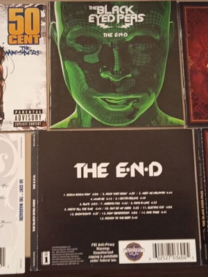50 Cent and The Black Eyed Peas booklets used, pack