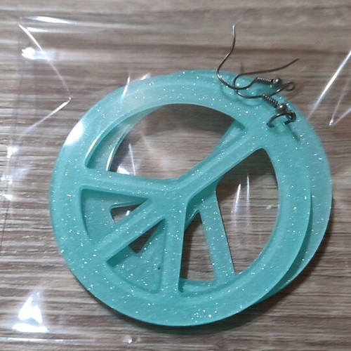 Peace turquoise dangling earrings new with glitter