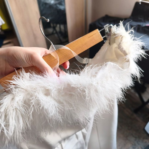 White women's one-piece jumpsuit with feathers like new, size M