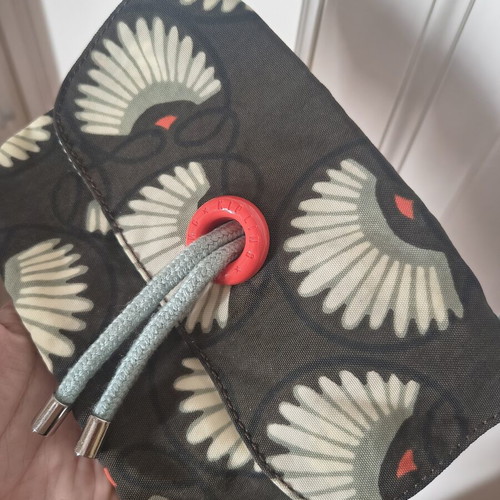 Kipling shoulder bag like new with floral design and practical cord closure