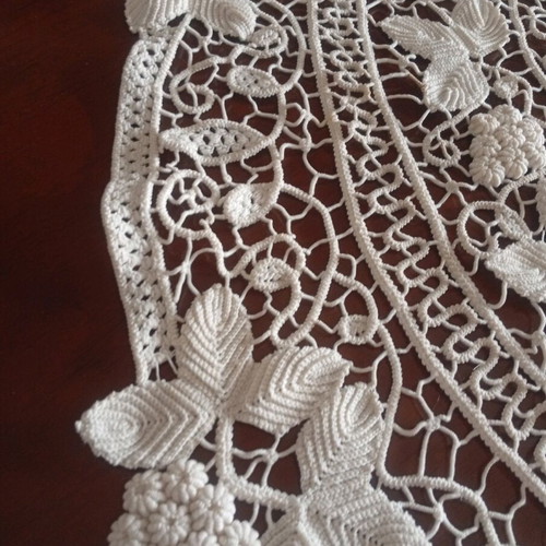 Antique handmade crochet table linen with grape cluster design used
