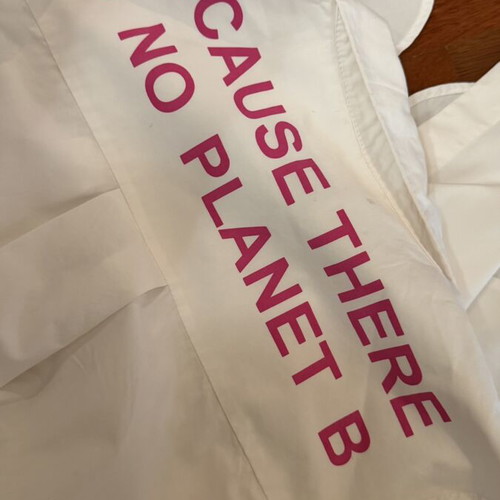 Set of 3 pieces like new, white semize shirt with letters, green skirt, fuchsia belt