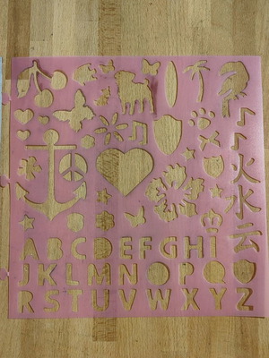 Stencil used with alphabet and shapes