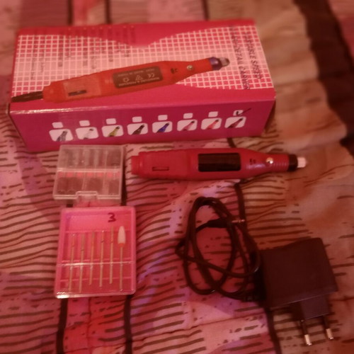 Electric nail file used with drill bits