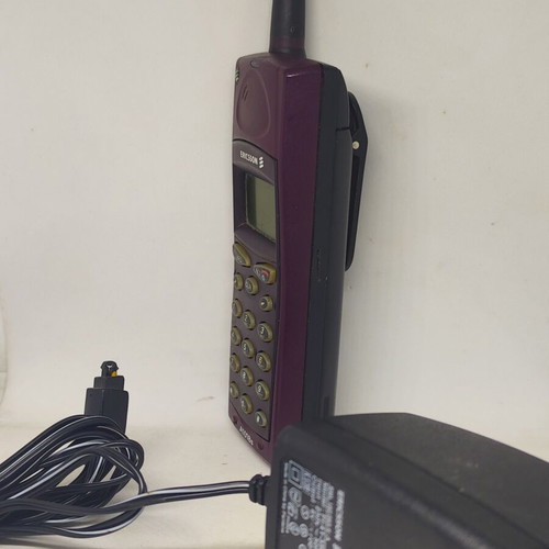 Ericsson A1018s mobile phone like new, plum color, original charger