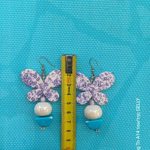 Butterfly clay earrings used with slight damage