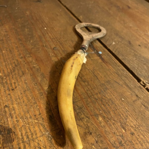 Vintage bottle opener used, height 16.5 cm
