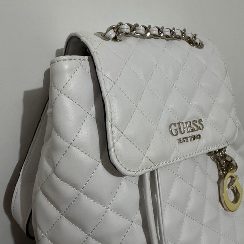 Guess Backpack white like new with silver details and charm