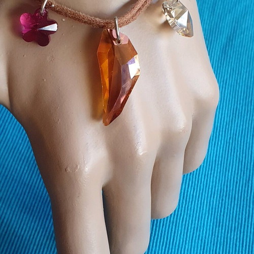 Adjustable bracelet used with brown and multicolor crystals