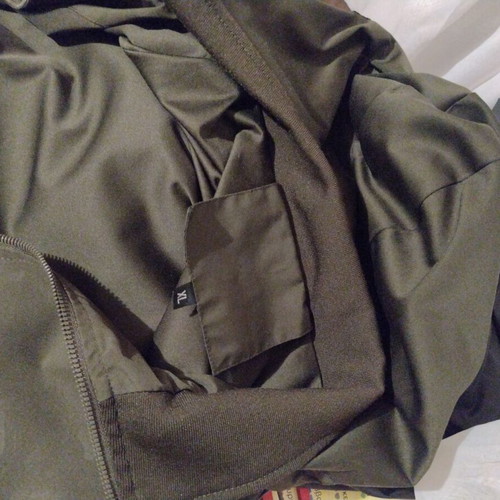 Khaki waterproof jacket like new, size XL